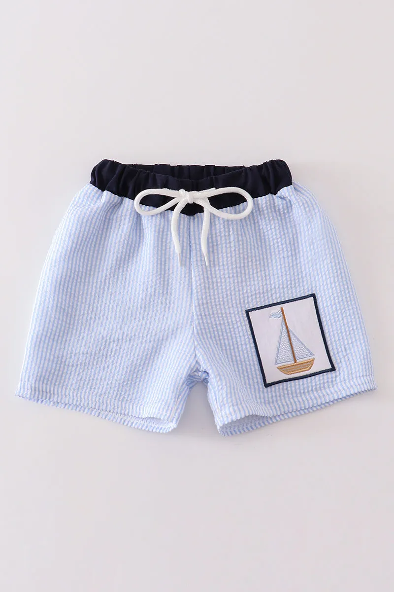 Blue seersucker sailboat embroidery boy swim trunks